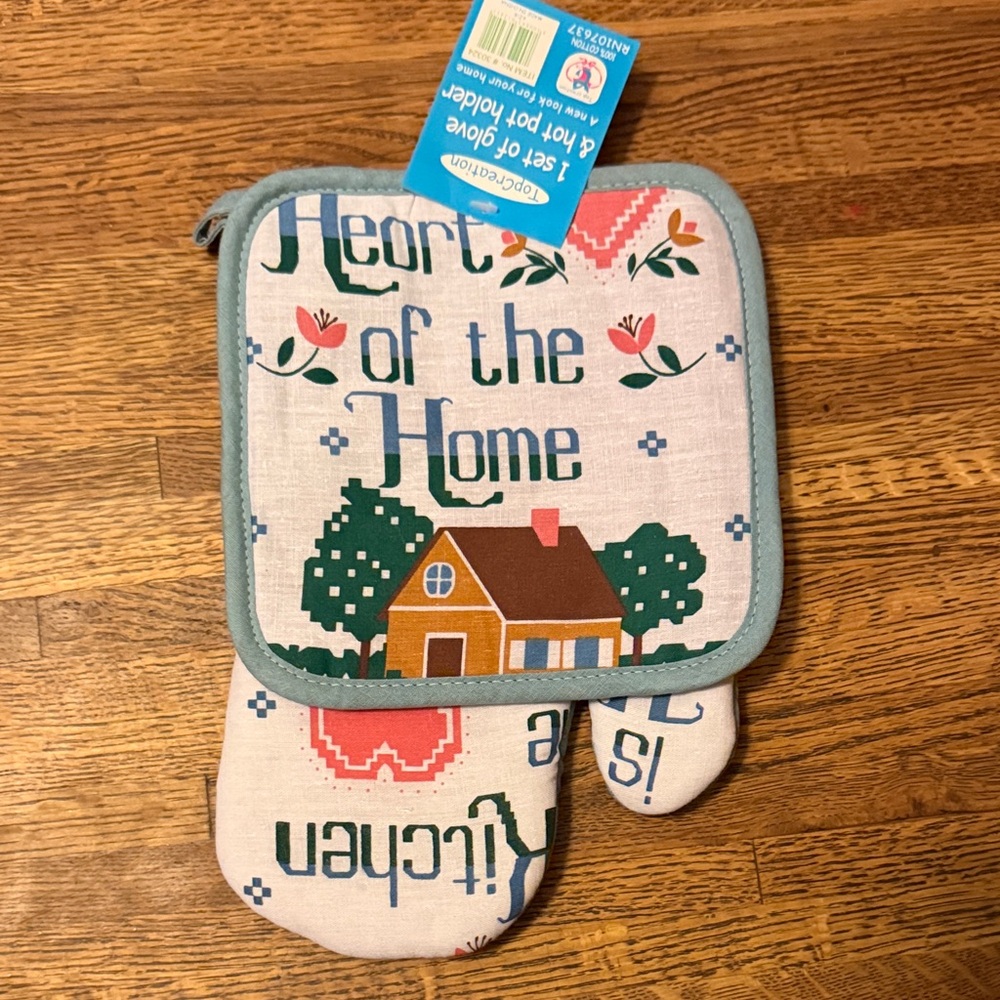 The kitchen is Heart of the Home Oven Mitt and Pot Holder Set Blue, Green, Brown